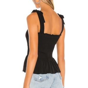 Worn once from revolve 1.state black tie shoulder smocked peplum knit top
